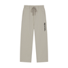 A pair of light beige drawstring sweatpants with the brand name 'REVIVAL' printed vertically in black on the left leg, shown against a plain white background.