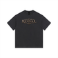 Black t-shirt with a small logo on a white background