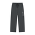 Dark gray jogger pants with an elastic drawstring waist and a vertical white &