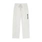 Light heather gray sweatpants with a drawstring waist and a vertical black 'REVIVAL' logo on the left leg, shown against a plain white background.