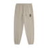 Apricot jogger pants with a brand logo on a white background