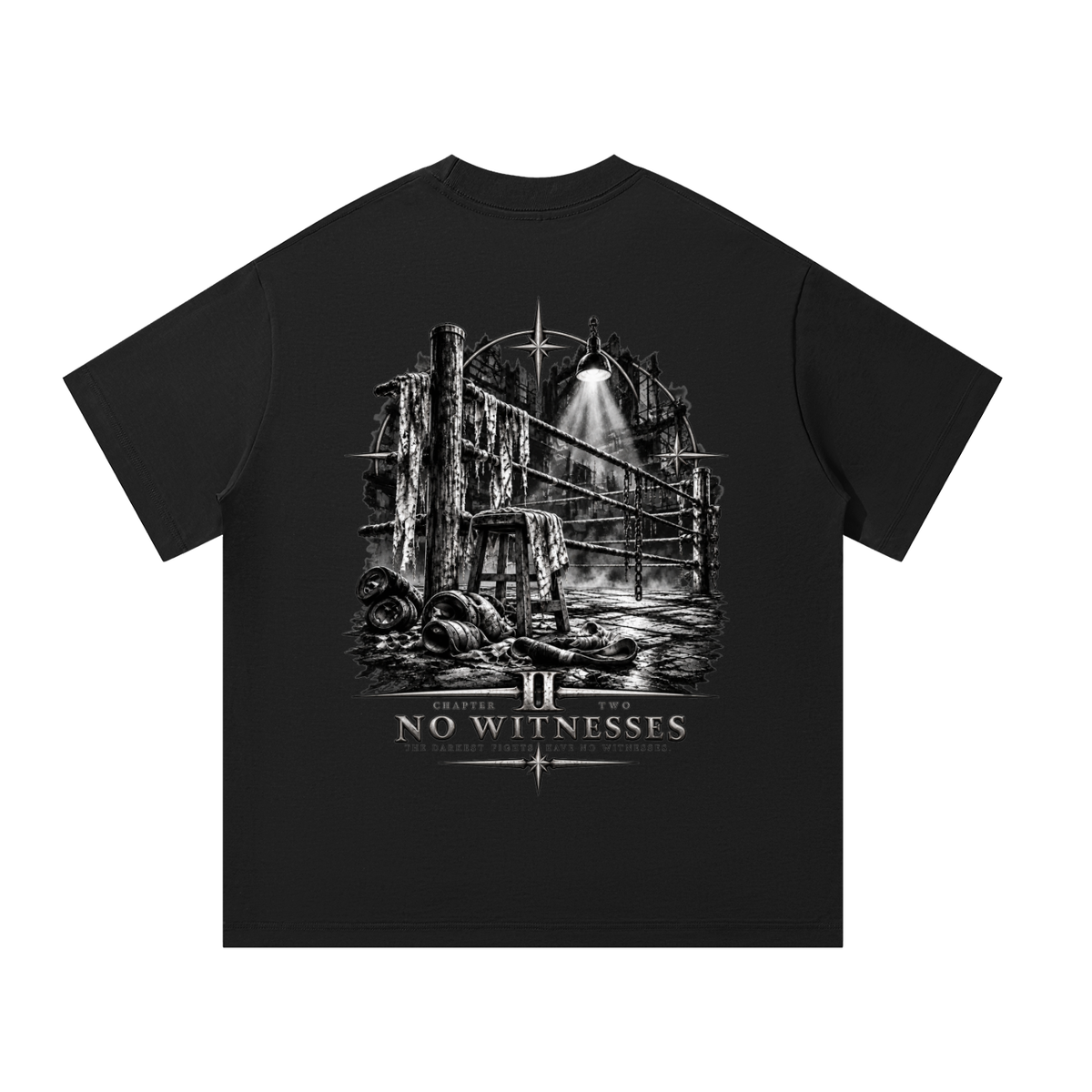 Black T-shirt featuring a monochrome industrial enclosure with steel beams, a harsh overhead spotlight, debris, and “Chapter II No Witnesses” lettering below.



