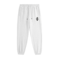 White jogger sweatpants with an elastic waistband, drawstring, side pockets, and a small black monogram logo on the left thigh, shown against a plain white background.