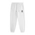 White jogger sweatpants with an elastic waistband, drawstring, side pockets, and a small black monogram logo on the left thigh, shown against a plain white background.