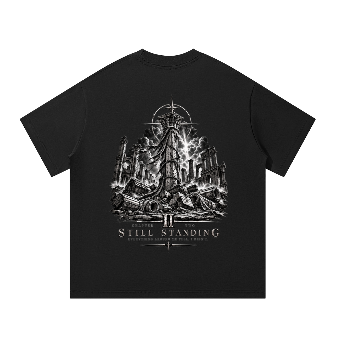Black T-shirt featuring a monochrome gothic ruins graphic with a central cross-like figure and “Still Standing” Chapter II lettering.



