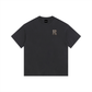 Black t-shirt with a logo on the chest against a white background