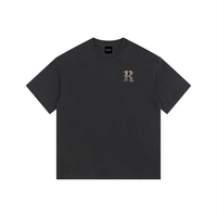 Black t-shirt with a logo on the chest against a white background