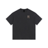 Black t-shirt with a logo on the chest against a white background