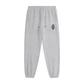 Gray jogger pants with a brand logo on a white background