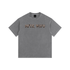 Gray t-shirt with a logo on the chest against a white background