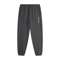 Black jogger pants with a logo on a white background