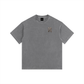 A gray short-sleeve crewneck t-shirt with a small gold graphic on the left chest, displayed flat against a solid white background.