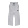 Light heather gray sweatpants with a drawstring waist and a small embroidered graphic on the left thigh, shown against a plain white background.